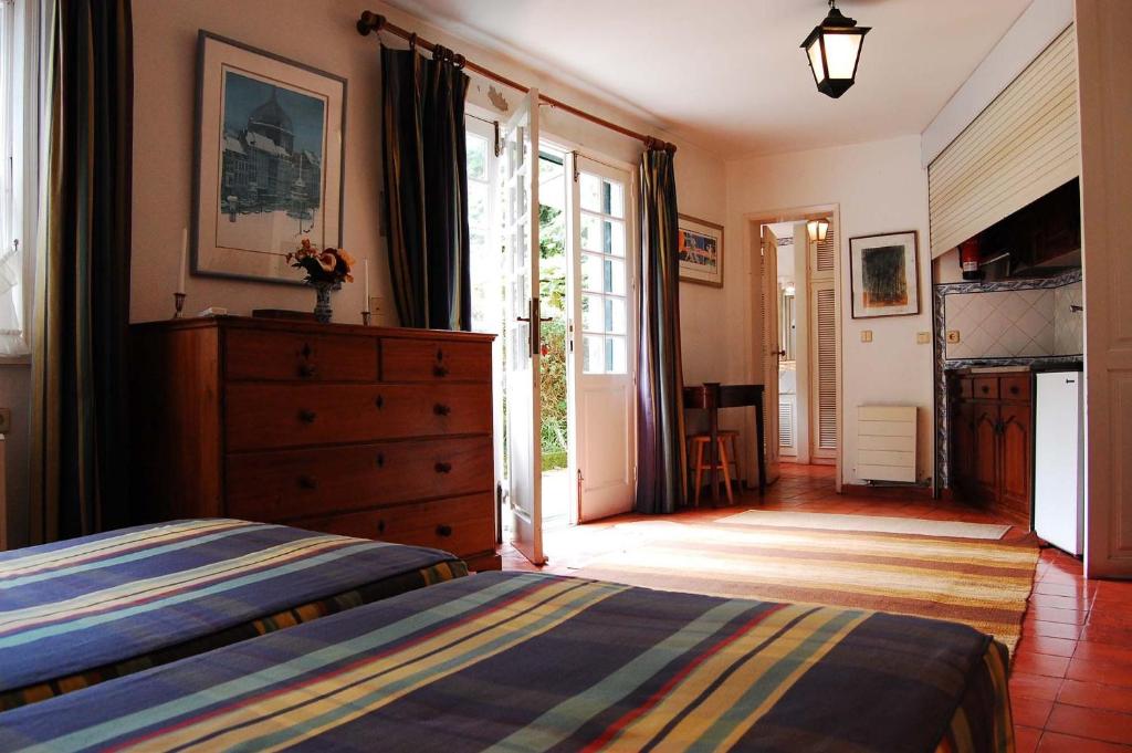 Uma cama ou camas num quarto em Casa de Esteiro