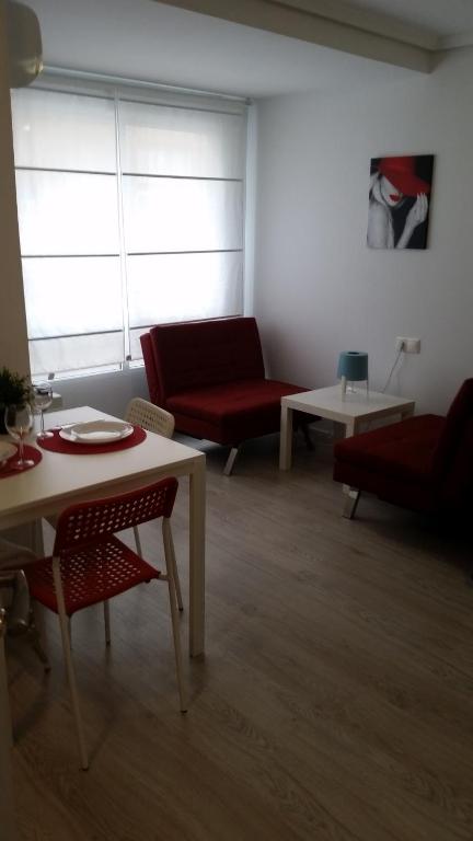 Posezení v ubytování Apartamento Moriones A. A150 m del mar en centro de ciudad