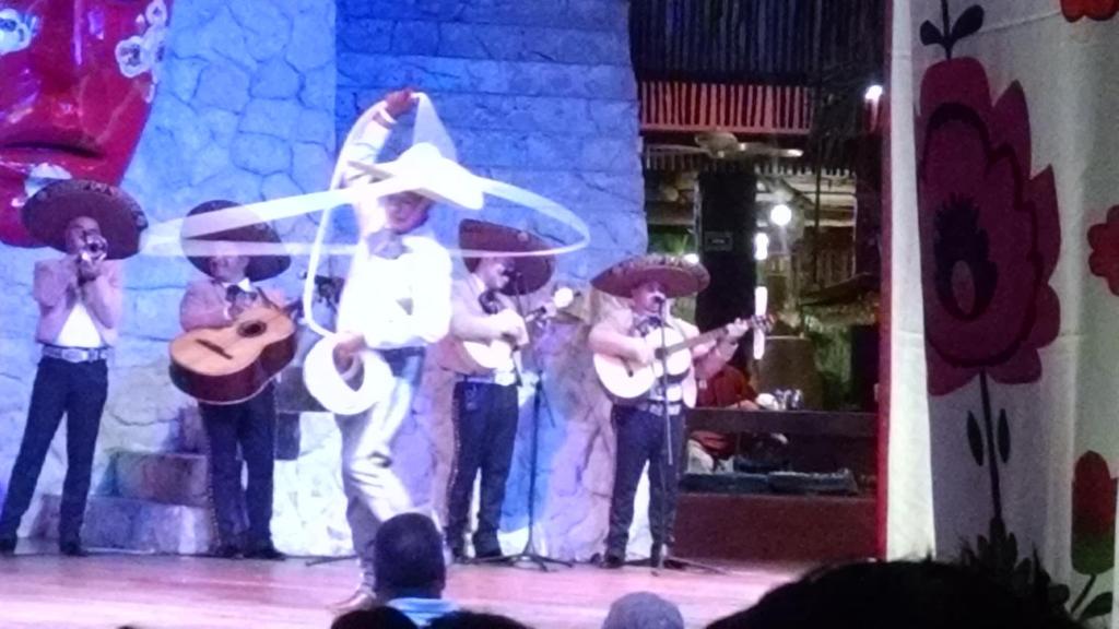 a group of men playing instruments on a stage at Suites at Mayan Palace Vidanta Resort Riviera Maya in Playa del Carmen