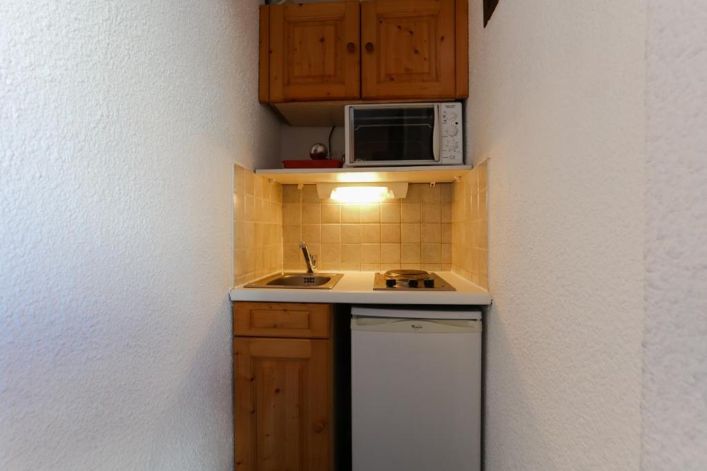 Kuchyň nebo kuchyňský kout v ubytování Vacancéole - Résidence Plein Sud