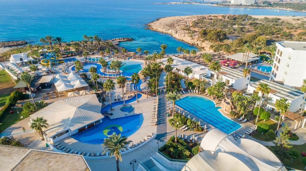 an aerial view of the pool at the resort at Adams Beach Hotel & Spa in Ayia Napa