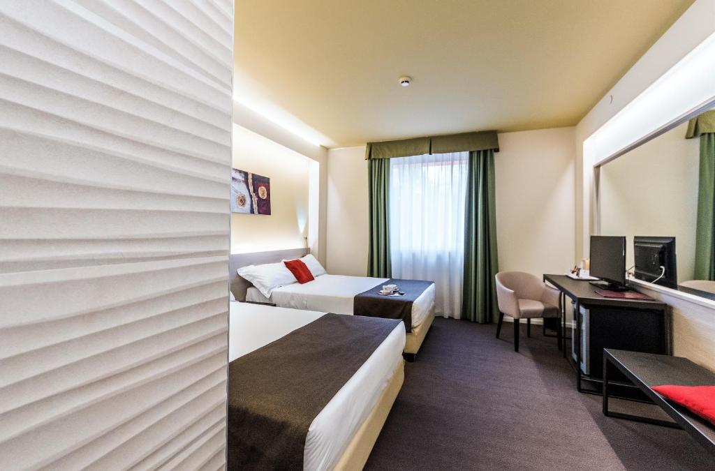 Postel nebo postele na pokoji v ubytování Antony Hotel - Venice Airport