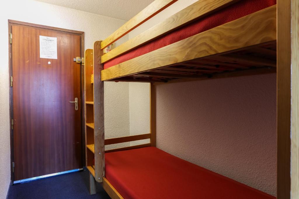 Postel nebo postele na pokoji v ubytování Vacancéole - Résidence Plein Sud