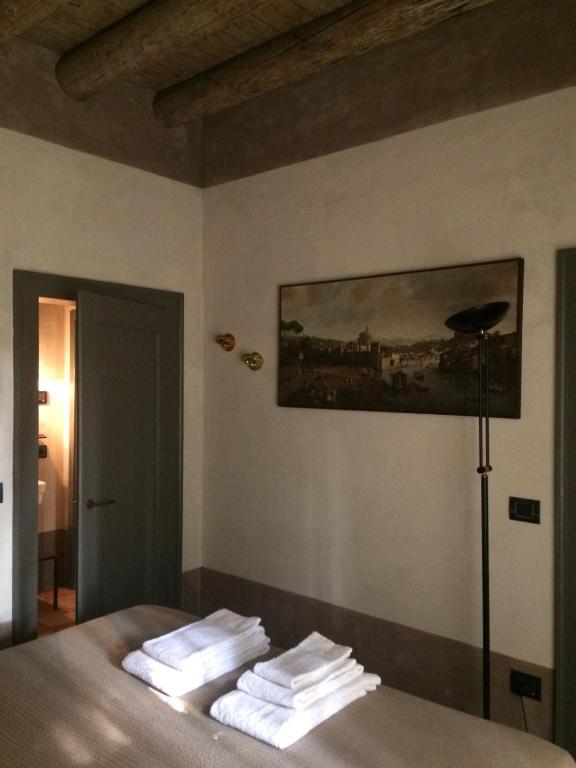 Postel nebo postele na pokoji v ubytování B&B Molino2Rosso