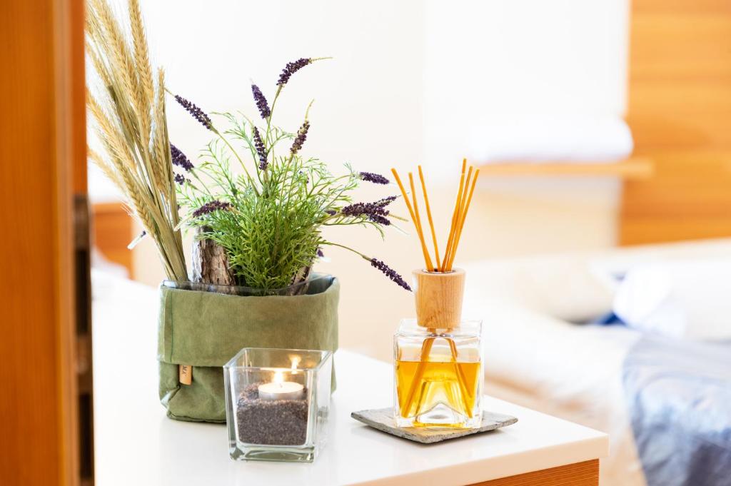 Postel nebo postele na pokoji v ubytování Vitalhotel Dosses