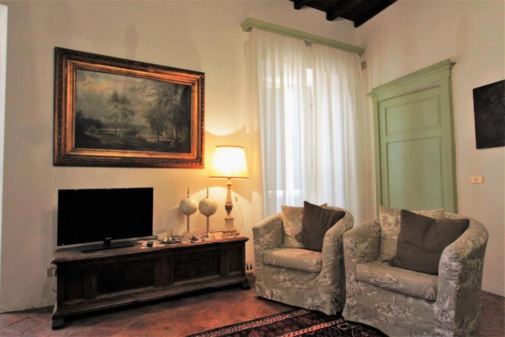 A television and/or entertainment centre at Apartment Casa Gianfrati