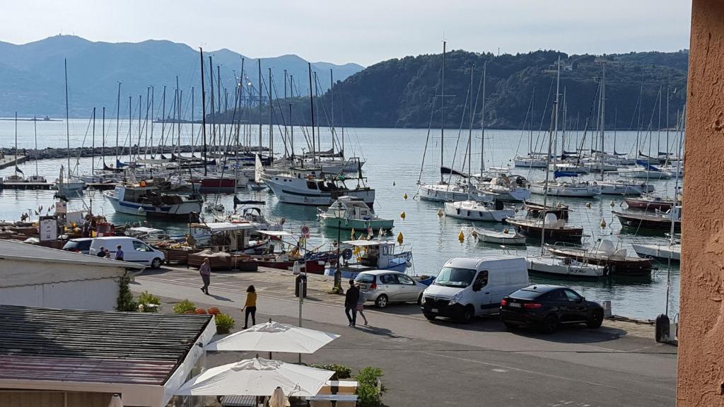 a group of boats parked at a marina at Fronte Mare Sul Molo in Lerici