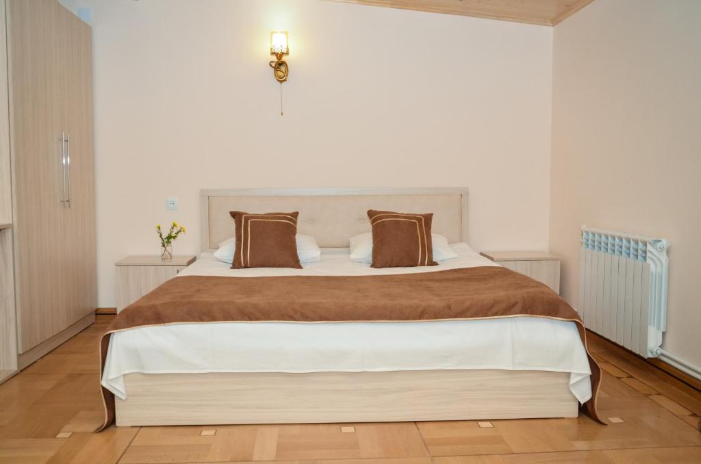 Postel nebo postele na pokoji v ubytování Rubin Hotel