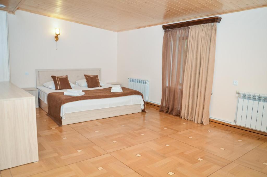 Postel nebo postele na pokoji v ubytování Rubin Hotel