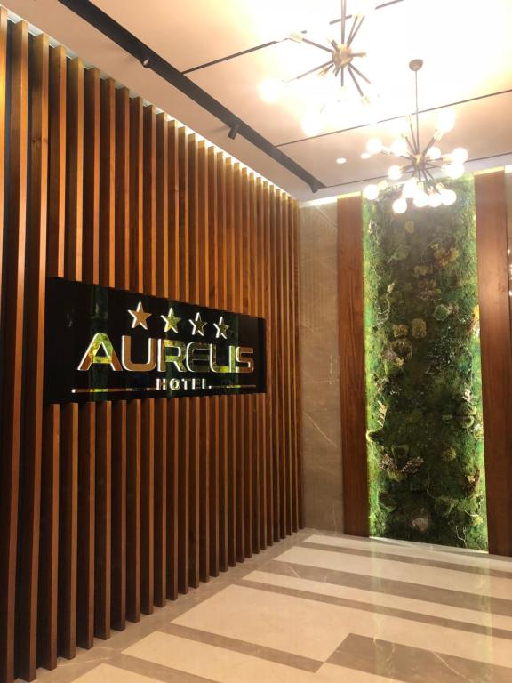 Certificado, premio, señal o documento que está expuesto en Aurelis Hotel