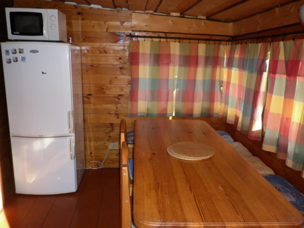 Kuchyň nebo kuchyňský kout v ubytování CHATA STRÁŽ