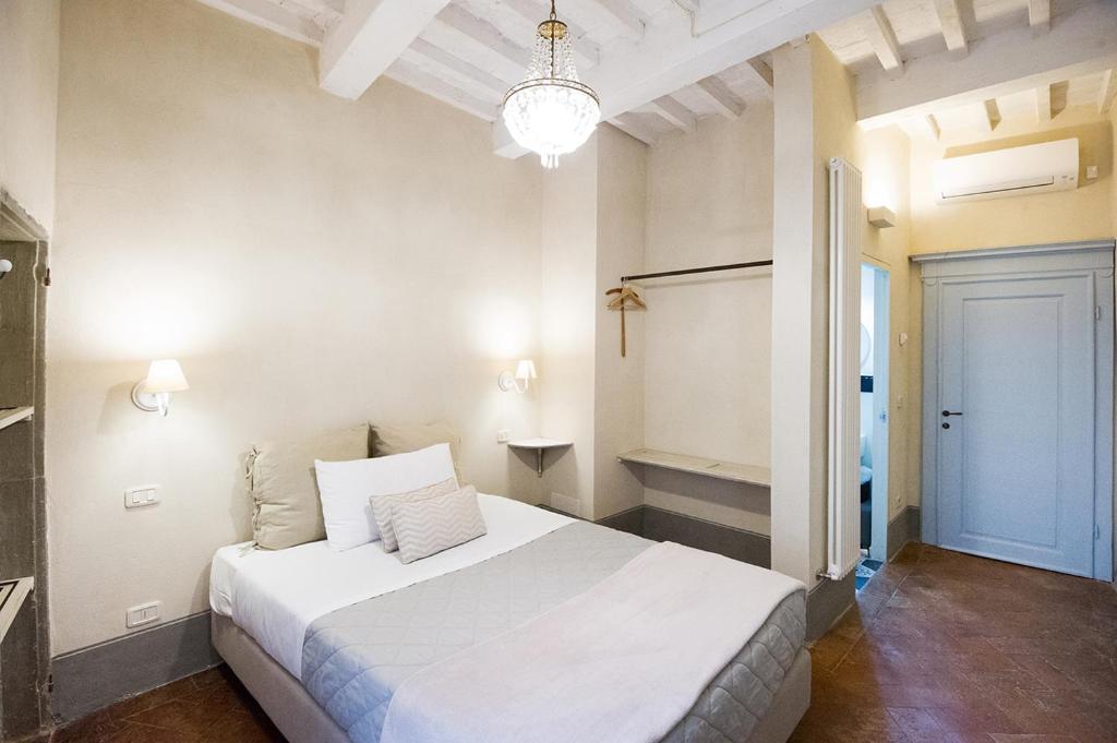 Posteľ alebo postele v izbe v ubytovaní Il Piccolo Cavour Charming House B&B