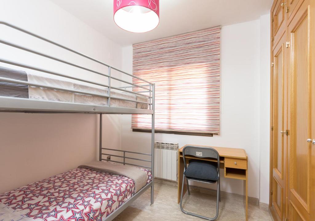 Posteľ alebo postele v izbe v ubytovaní Apartment Rambla Tarragona Free parking