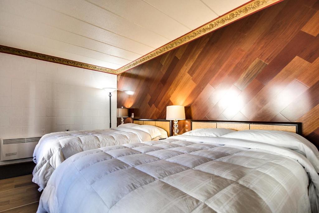 Postel nebo postele na pokoji v ubytování Motel Bellefeuille