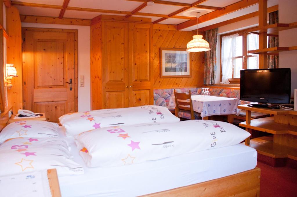 Postelja oz. postelje v sobi nastanitve Hotel-Gasthof "Zur Mühle"