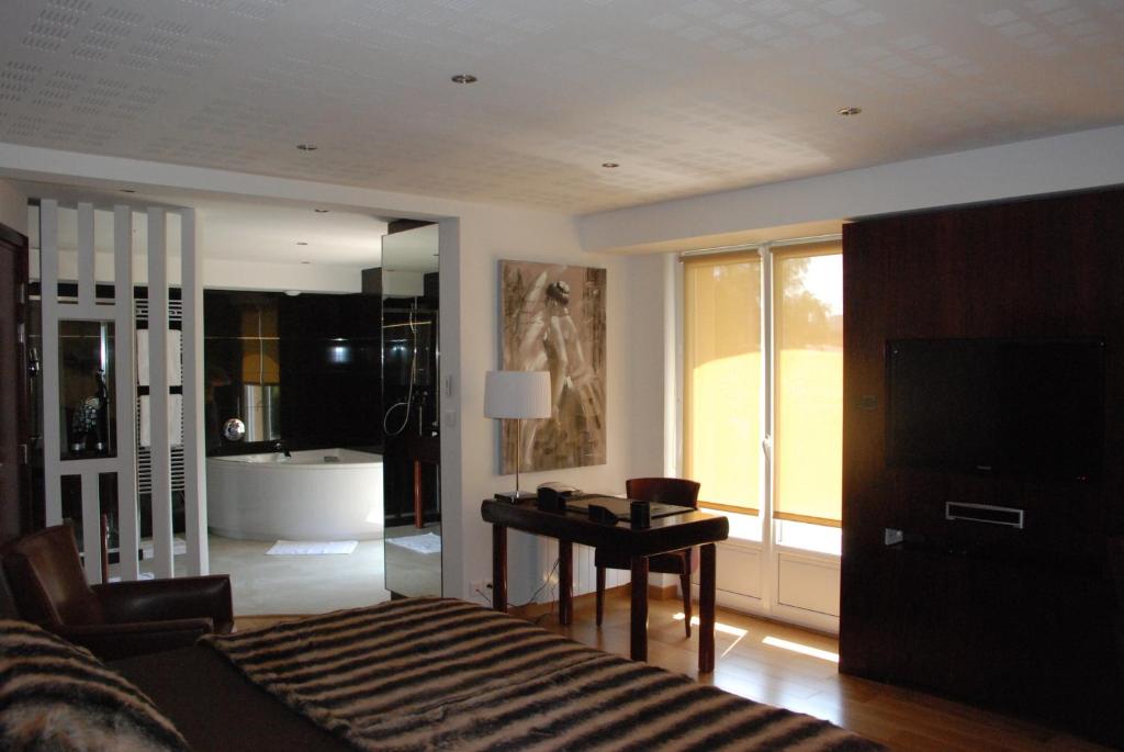 Posezení v ubytování Hôtel Ariane & SPA