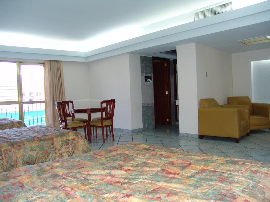 Posezení v ubytování Hotel Posada Arcos