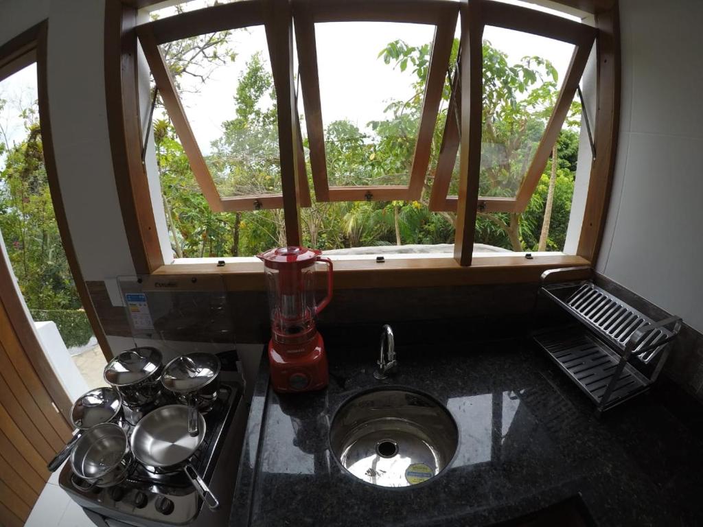 Kuchyň nebo kuchyňský kout v ubytování Pousada Residence Vila das Flores