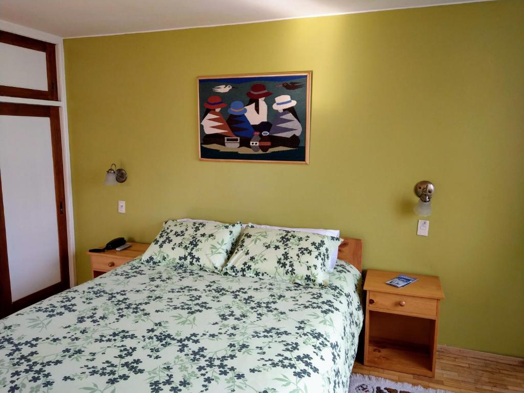 Postel nebo postele na pokoji v ubytování Hotel Rincon Aleman