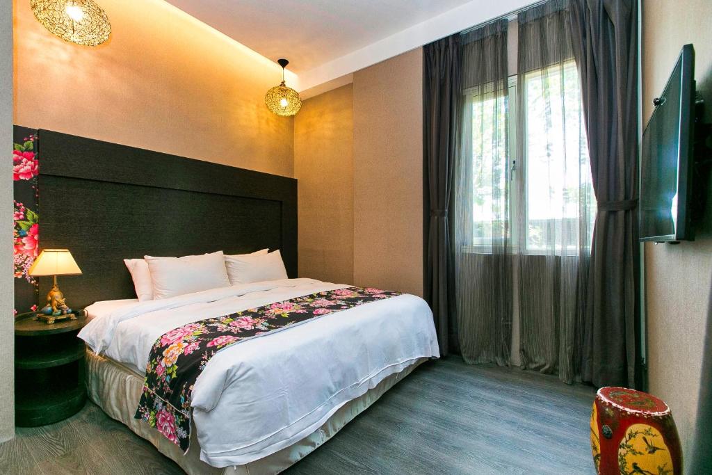 Postel nebo postele na pokoji v ubytování Pokara Resort