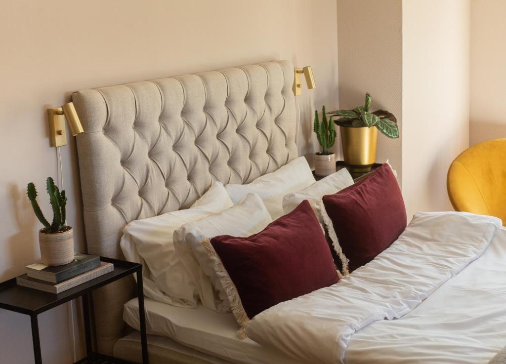 Postel nebo postele na pokoji v ubytování Hotell Bogesund