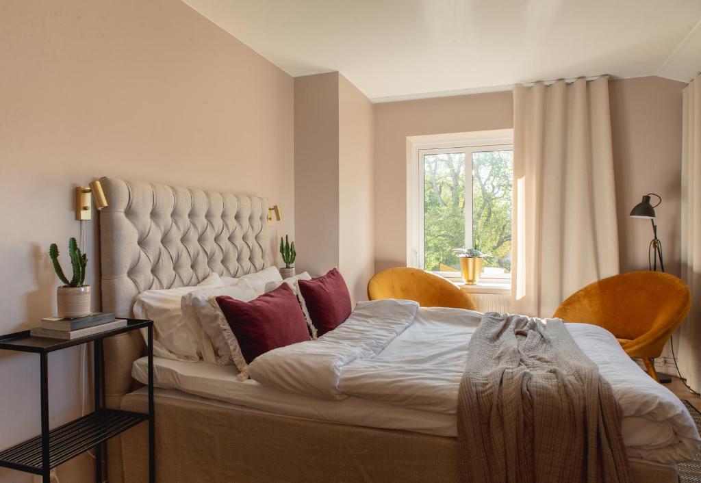Postel nebo postele na pokoji v ubytování Hotell Bogesund