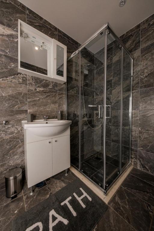 Koupelna v ubytování Apartments Vukman