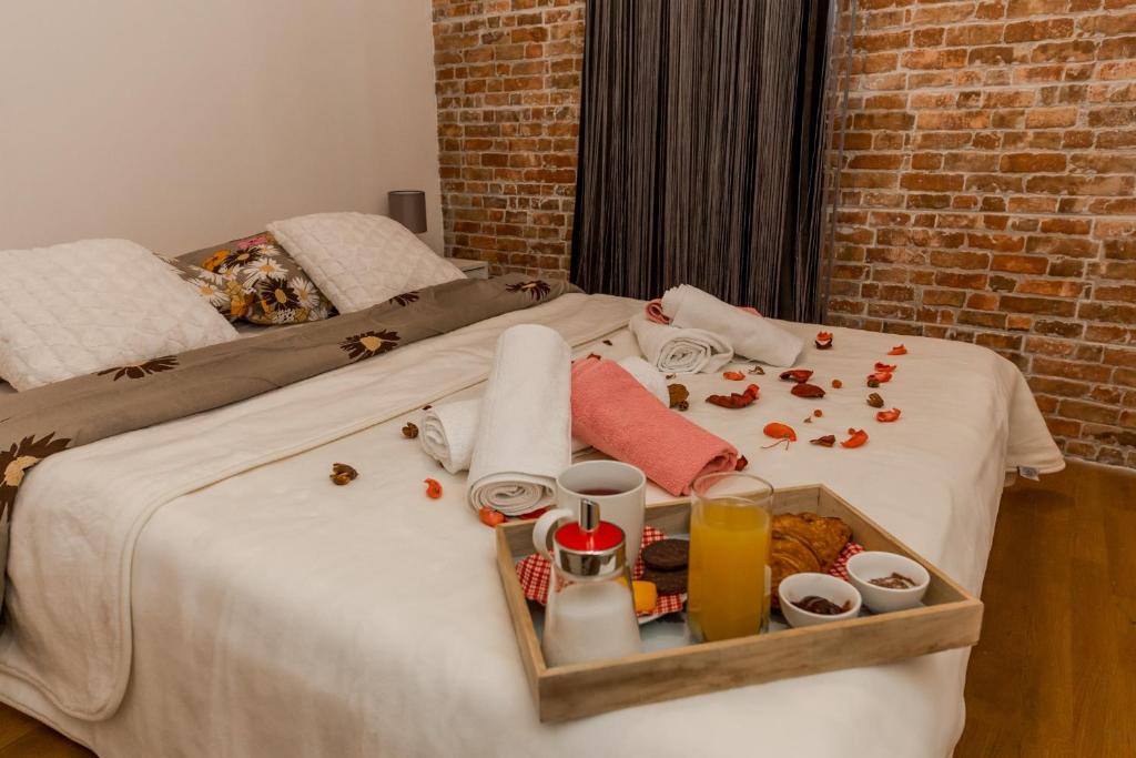 Postel nebo postele na pokoji v ubytování Apartments Vukman
