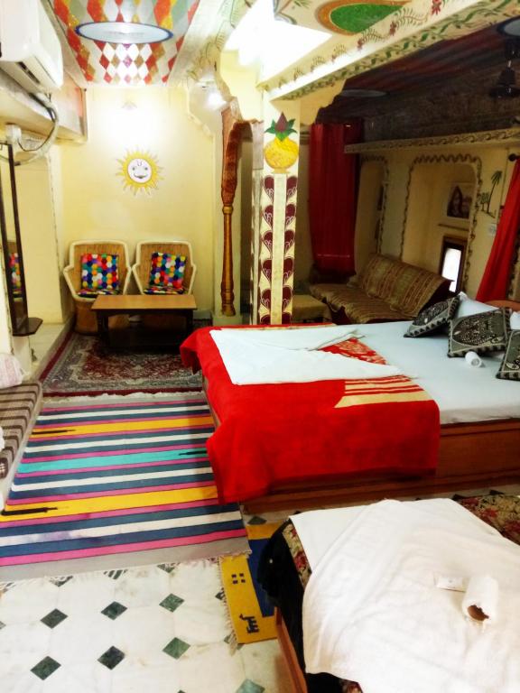Postel nebo postele na pokoji v ubytování Hotel Paradise
