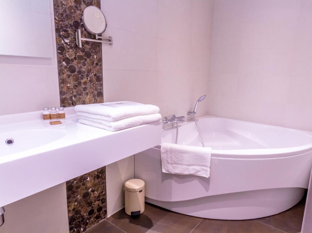 Koupelna v ubytování ManavaHotel