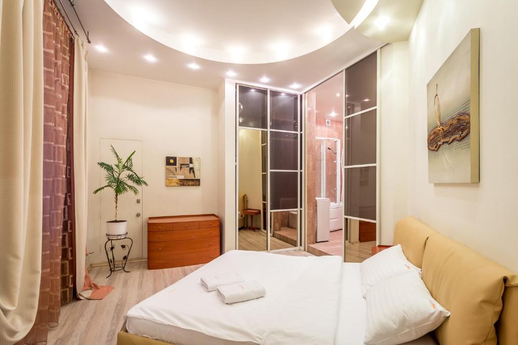 Ліжко або ліжка в номері DayFlat Apartments Khreschatyk