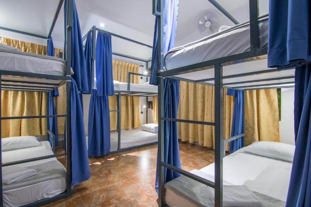 Postel nebo postele na pokoji v ubytování Bokre Angkor Hostel