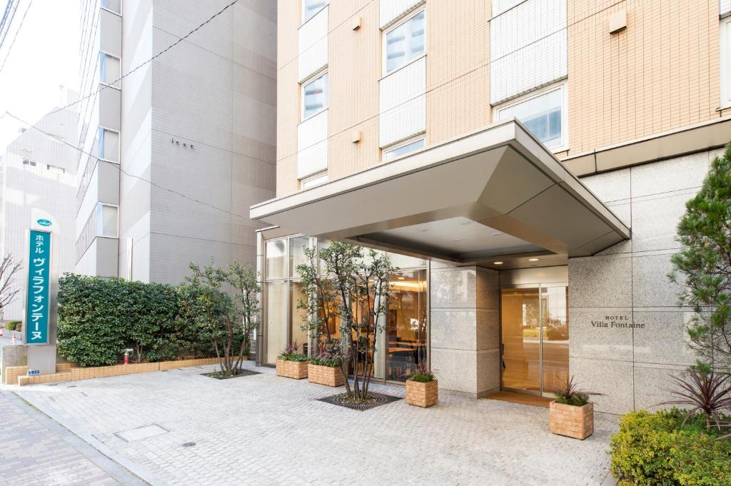 a lobby of a building with an awning on it at Hotel Villa Fontaine Tokyo-Hamamatsucho in Tokyo
