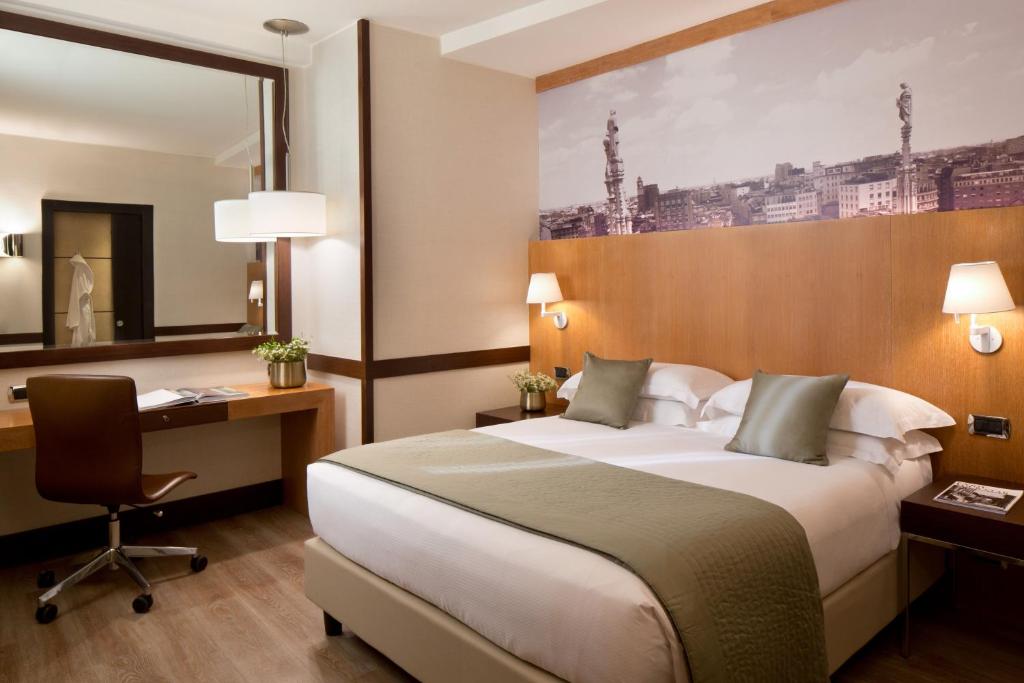 Postel nebo postele na pokoji v ubytování Starhotels Ritz