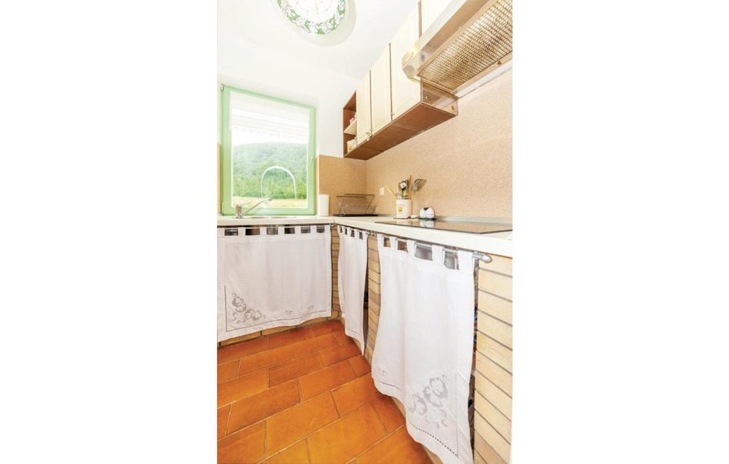 Kuchyň nebo kuchyňský kout v ubytování Marcos House