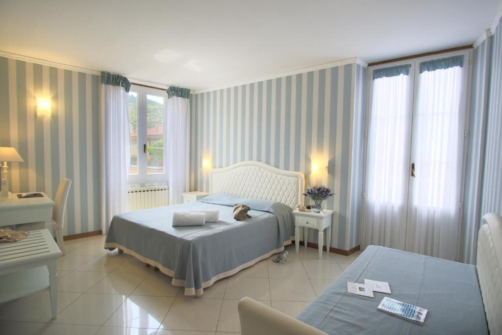 Posteľ alebo postele v izbe v ubytovaní Hotel Nazionale