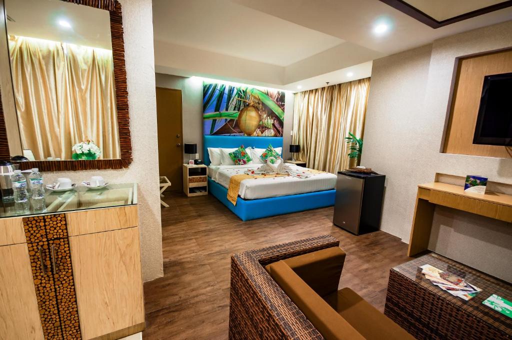 Postel nebo postele na pokoji v ubytování Aziza Paradise Hotel