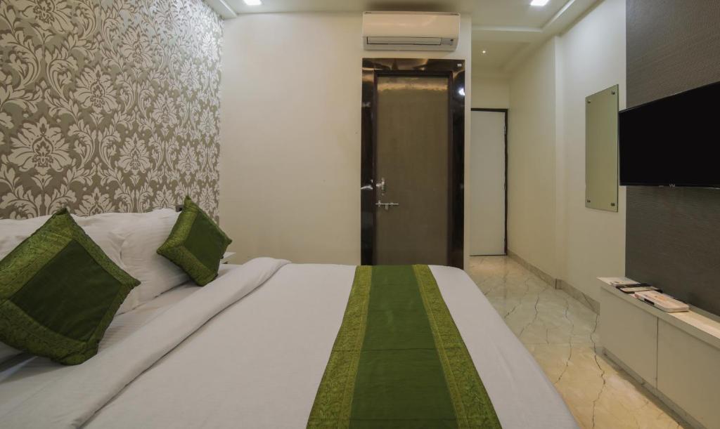 TV a/nebo společenská místnost v ubytování Itsy Hotels Le Clover