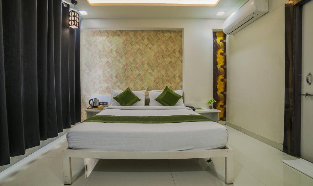 Postel nebo postele na pokoji v ubytování Itsy Hotels Le Clover