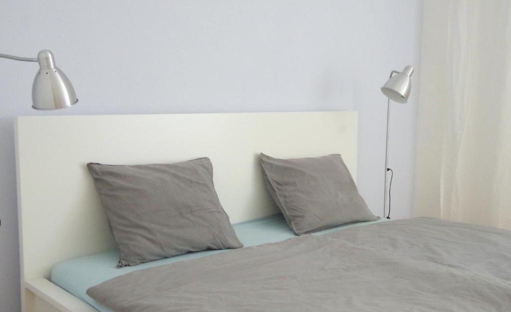 Postel nebo postele na pokoji v ubytování Casa Margarida Azul
