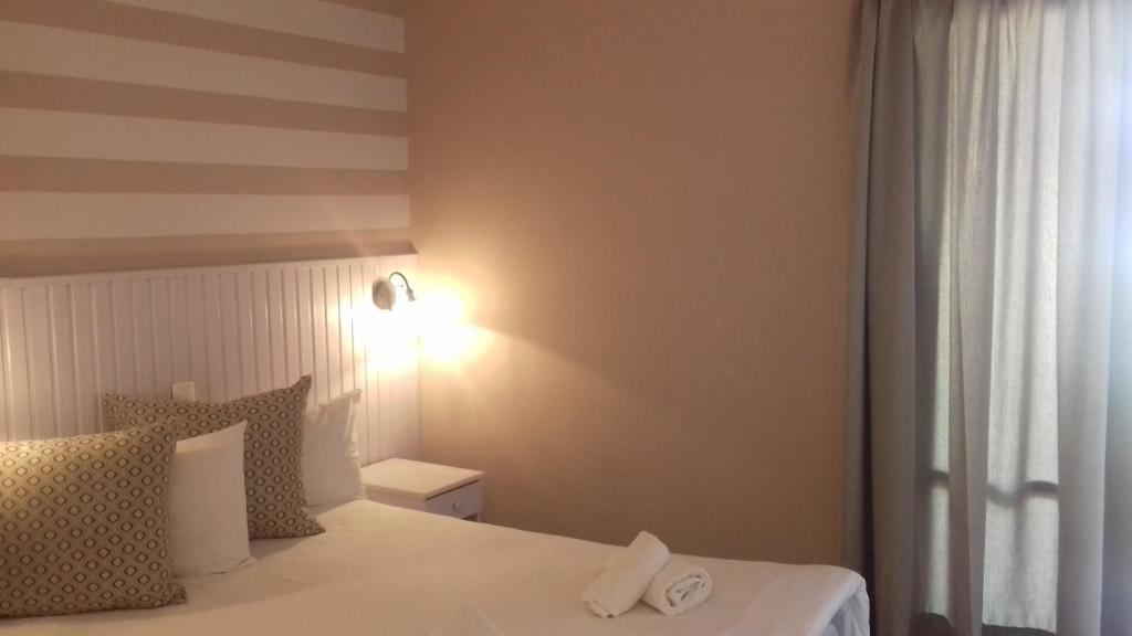 Postel nebo postele na pokoji v ubytování Guesthouse Mavrodimos