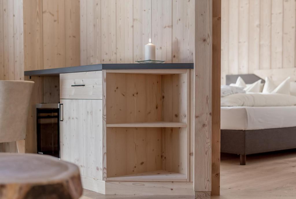 Postel nebo postele na pokoji v ubytování Hotel Garni Pirchhütt