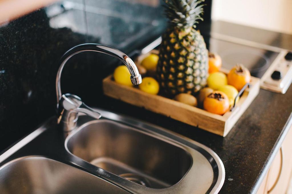 A kitchen or kitchenette at MAREA Hotel