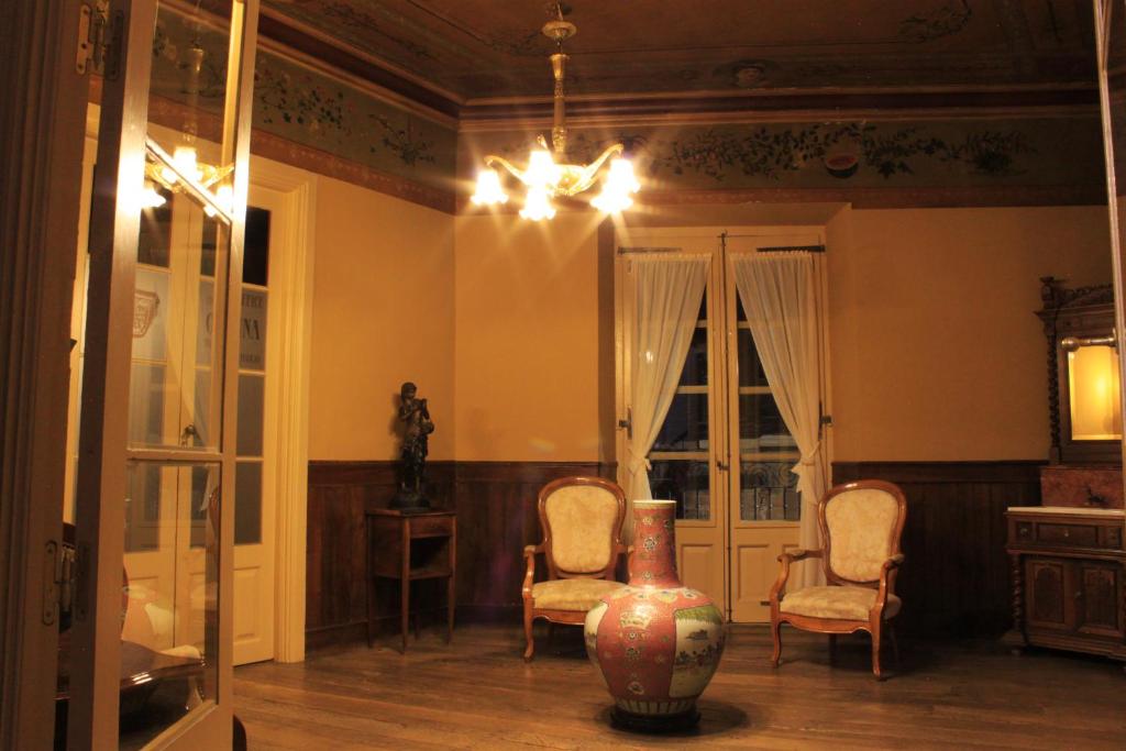 Posezení v ubytování Hostal Siglo XIX