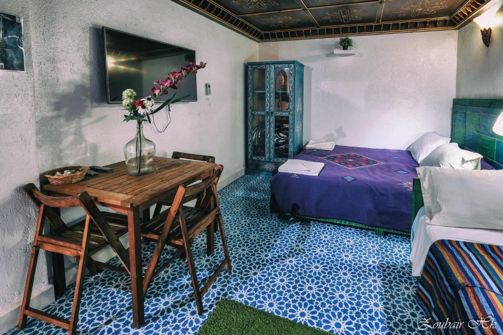Postel nebo postele na pokoji v ubytování Casa Elias
