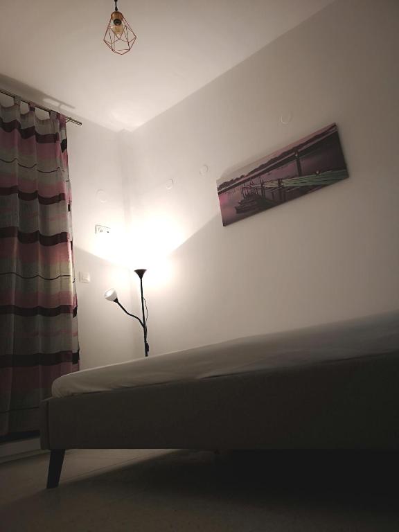 Postel nebo postele na pokoji v ubytování Dimitris House 7