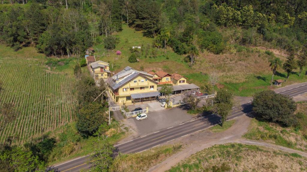 an aerial view of a house on a hill at Pousada Tio Mica in Nova Petrópolis