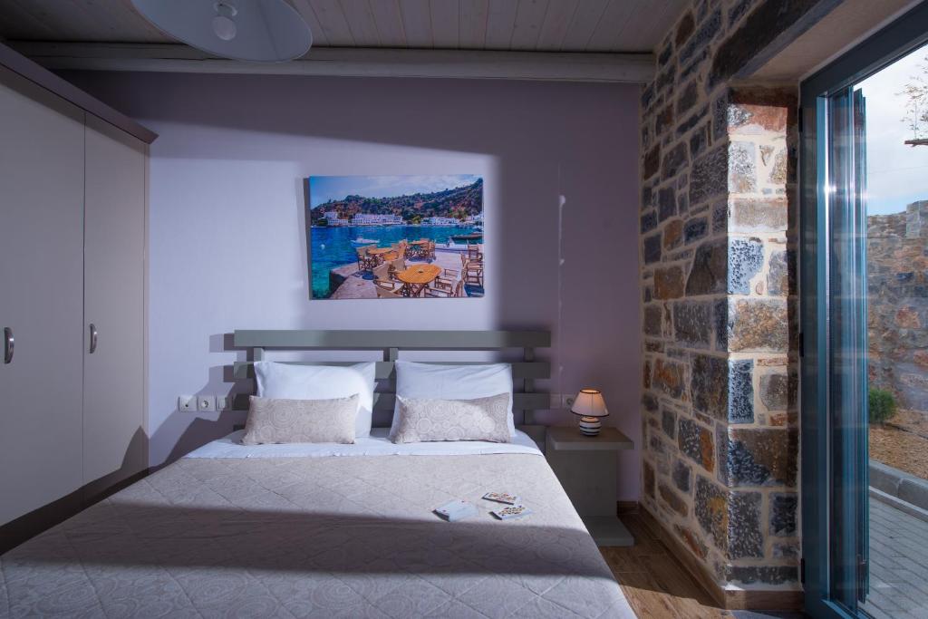 Posteľ alebo postele v izbe v ubytovaní Mandy Luxury Villa by Cretevasion