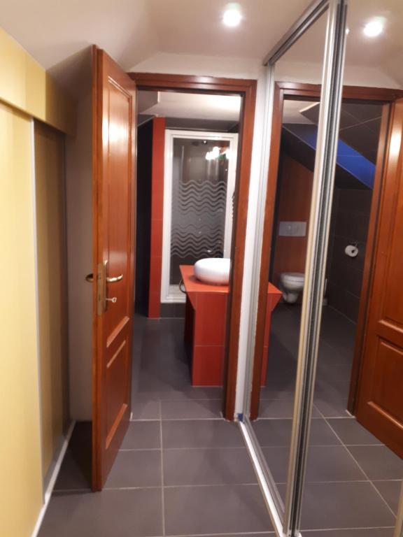 Łazienka w obiekcie Kertvárosi Apartman