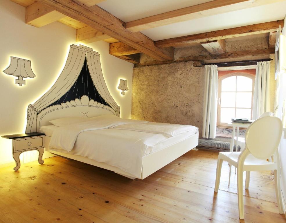 Postel nebo postele na pokoji v ubytování hotel rainhof scheune & naturpark restaurant (Kirchzarten)